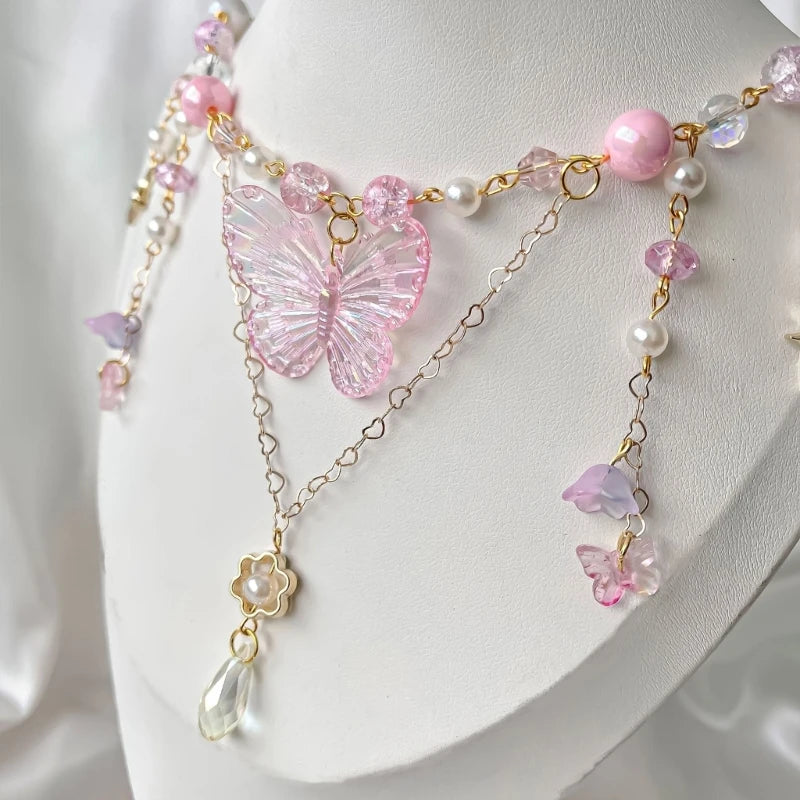Lightweight pink crystal butterfly necklace with adjustable chain for a comfy fit