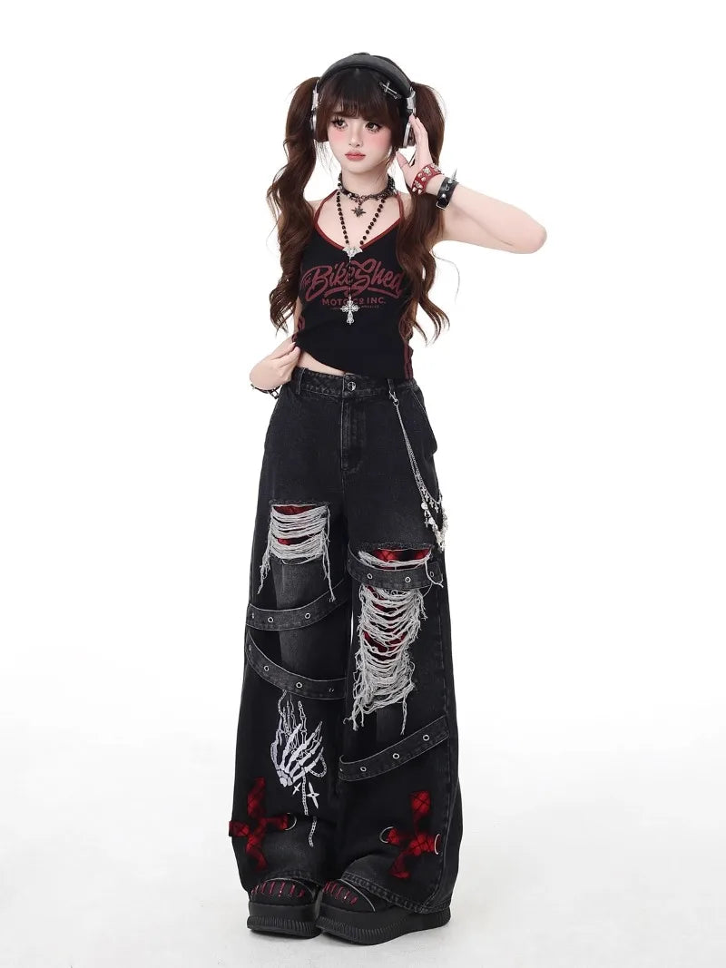 Black alternative goth denim pants with ripped details and bold aesthetic