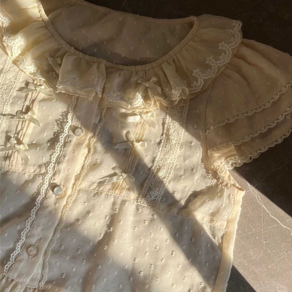 Apricot kawaii top featuring ruffle details and fairy-inspired design for sweet outfits