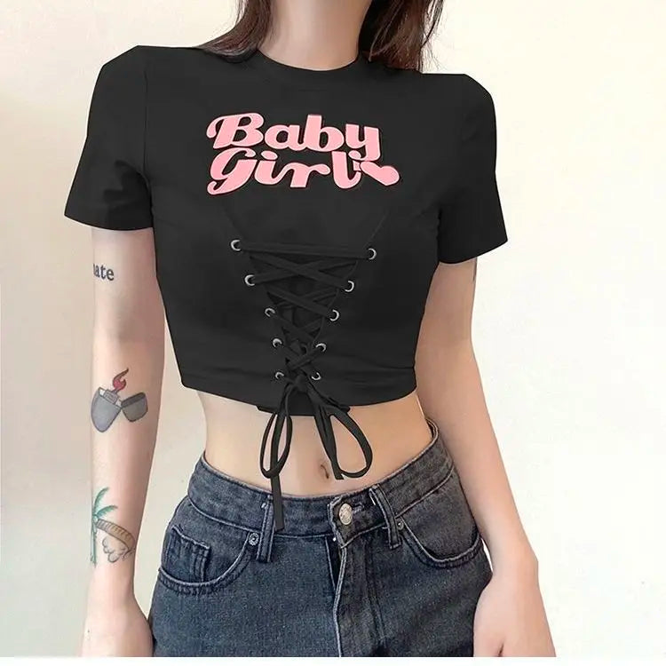 Babygirl Glow black lace-up crop top, perfect for baddiecore and little space outfits
