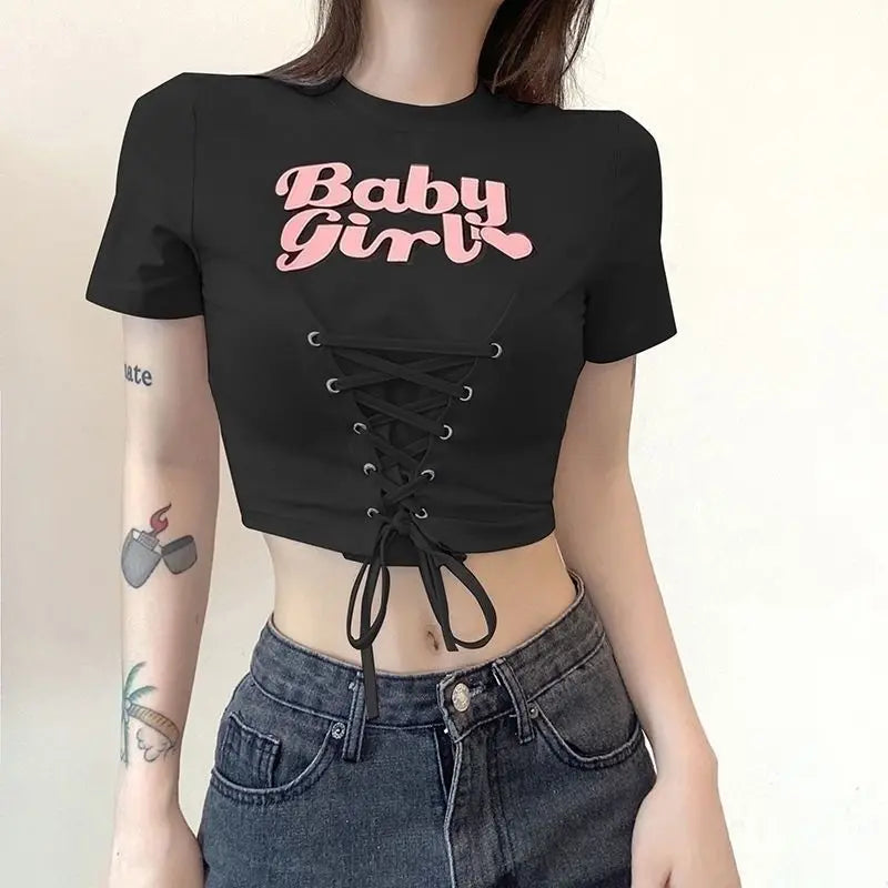 Babygirl Glow black lace-up crop top designed for ddlg and babygirl aesthetics
