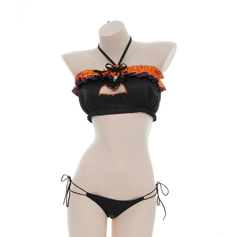 Model wearing Bat Cutout Ruffle Lingerie Set front, black ruffle bra with bat cutout and matching panties, spooky cute lingerie aesthetic π¦π₯