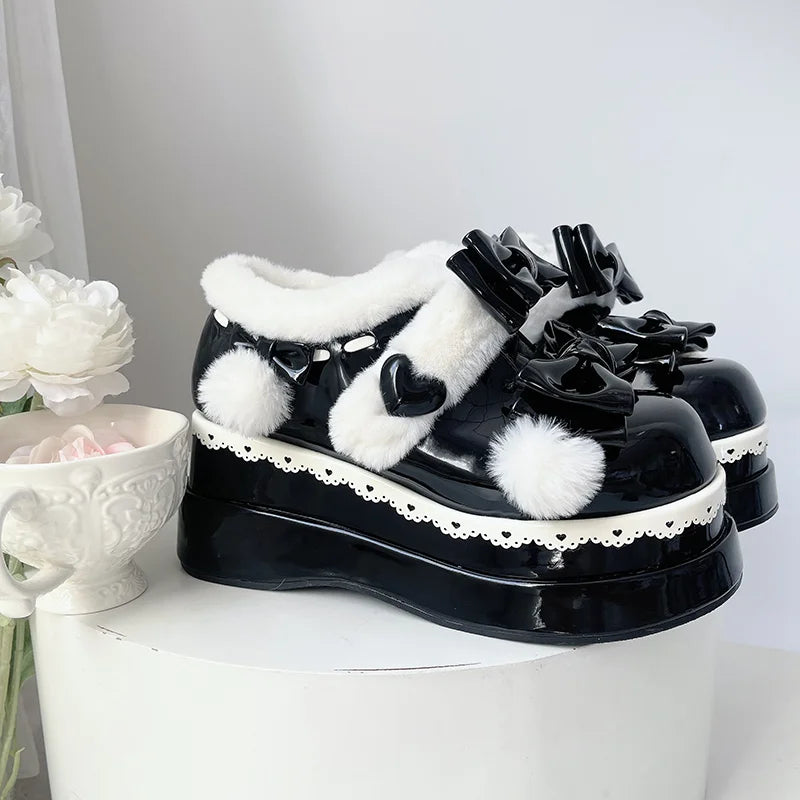 Cute black Pom Pom Angel Baby Platform Shoes with soft fur trim and heart details, made for DDLG soft girl style
