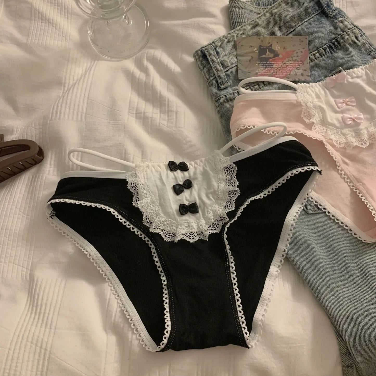 Black lolita panties with lace trim, front bows, and side ribbons for soft goth DDLG ABDL fashion