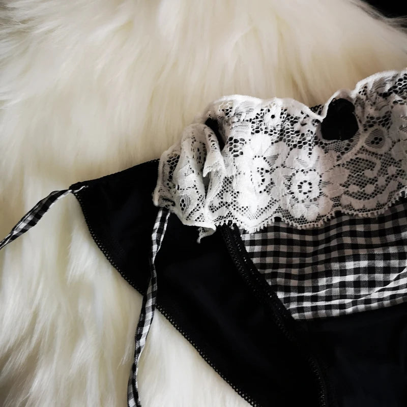 Black plaid panties with sweetheart detailing, lacy edges, and adjustable side laces for a flirty vibe
