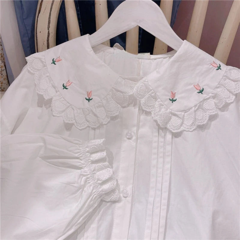 Plus size kawaii lolita top with pink floral details and a dreamy aesthetic