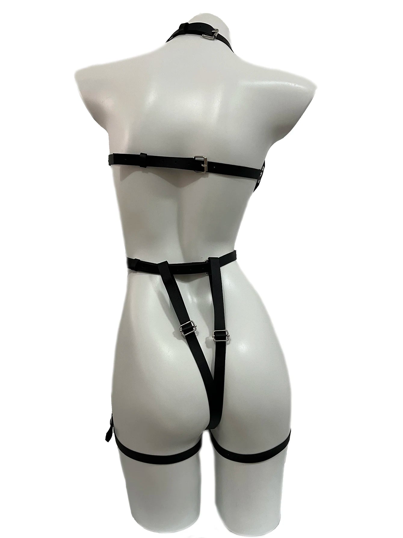 Back view of black BDSM-inspired strap and tight set with adjustable fit