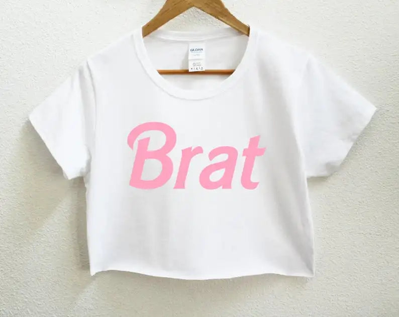 Brat Energy Crop Top in white with soft breathable fabric, flattering cropped fit, perfect for ddlg, abdl, and baddie vibes