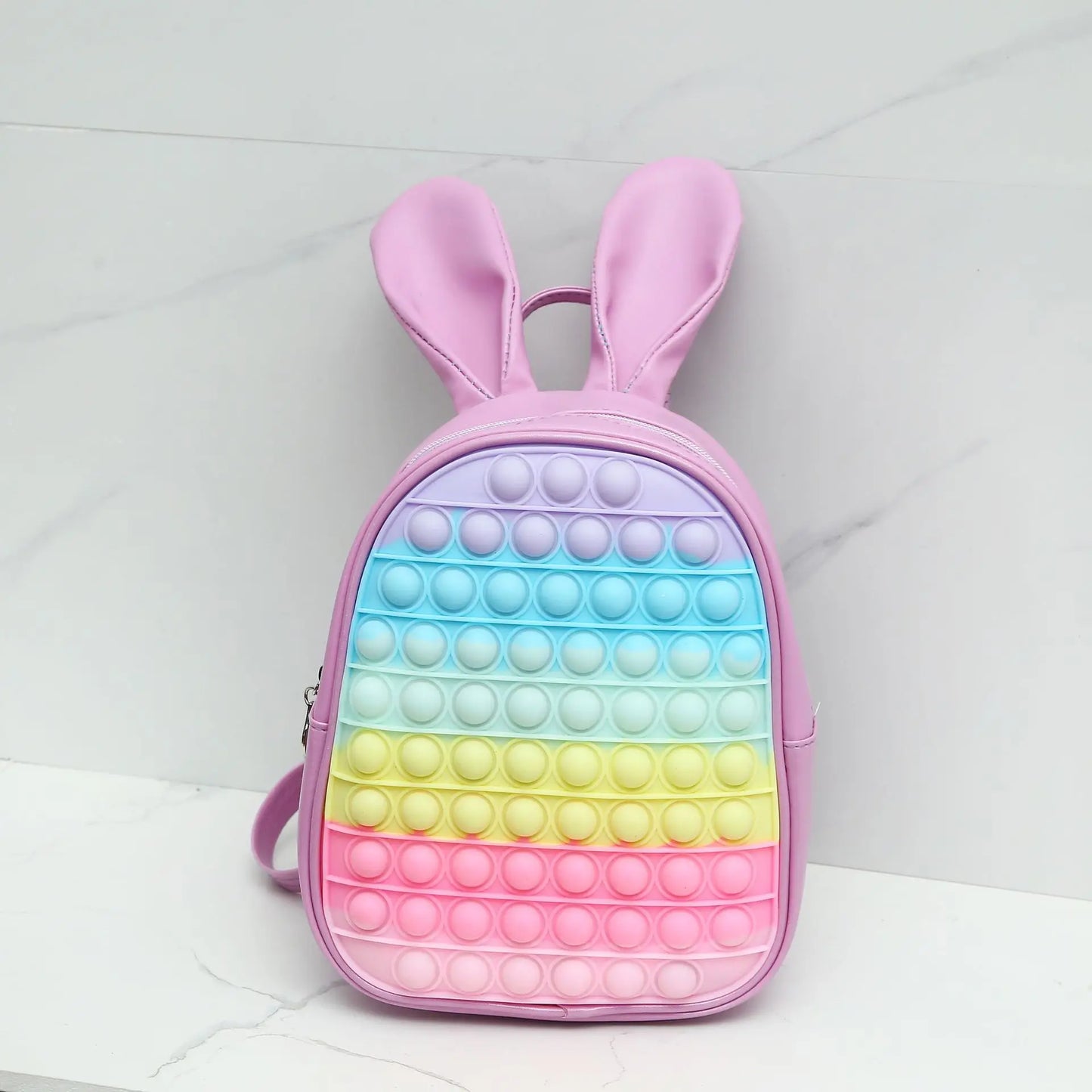 Bubble Pop Bunny Backpack in light pink silicone, kawaii ABDL sensory pop accessory