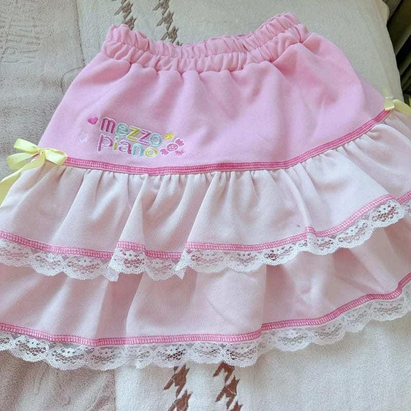 Cute bubblegum pink ruffle skirt with bows and lace, perfect for little space and playful kawaii looks