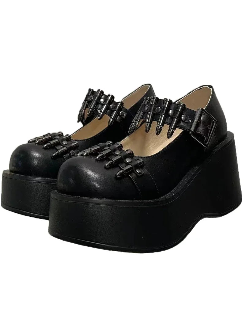 Statement platform shoes with bullet detailing and chunky sole for kawaii punk and cutecore fashion