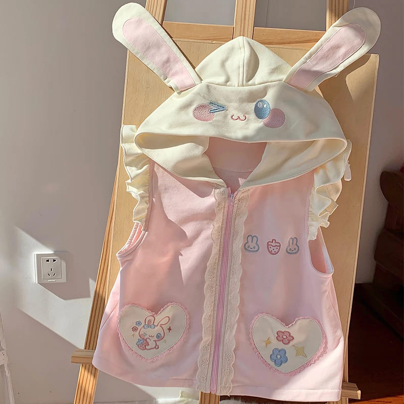 Playful kawaii bunny outfit set with hood, ruffles, and embroidered details