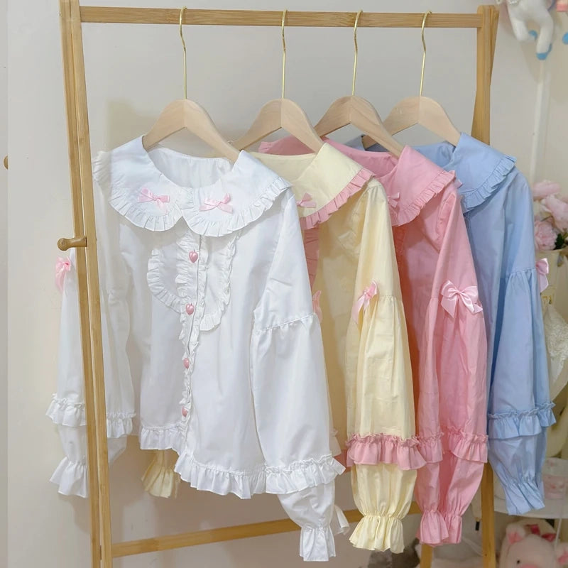 Bunny Lolita ears blouse collection in pastel yellow, white, blue, and pink, kawaii playful hood and Peter Pan collar styles