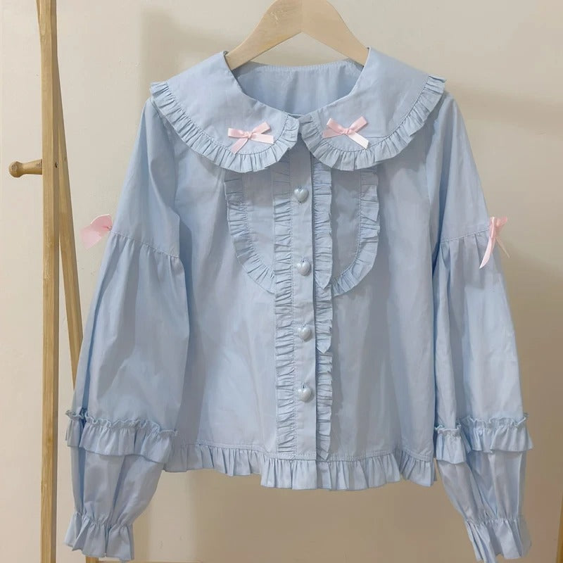 Pastel blue Bunny Lolita ears blouse featuring cute hood ears, sweet Peter Pan collar, and lightweight breathable fabric