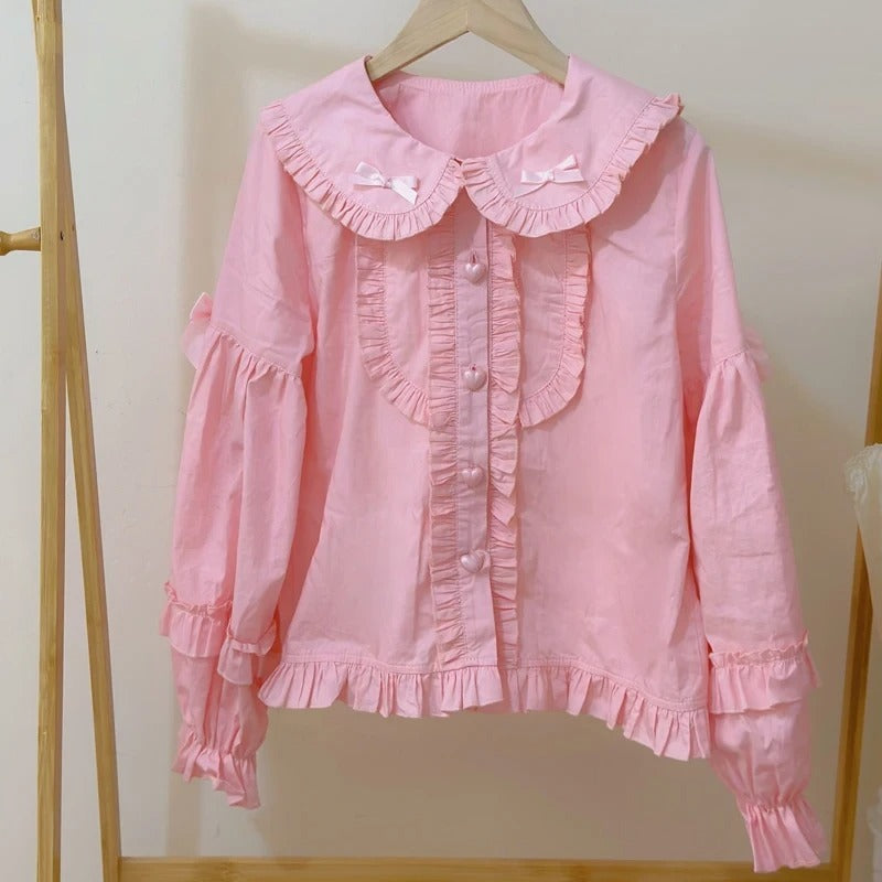 Pastel pink Bunny Lolita ears blouse with playful bunny hood, Peter Pan collar, and delicate bows, comfy for all-day wear