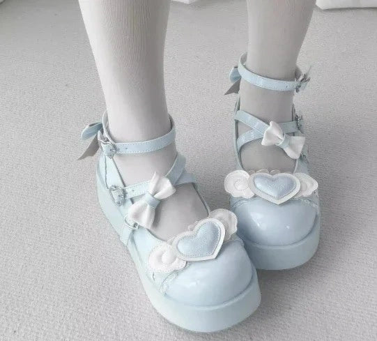 Light blue Cherub Heart Cutie Platforms with angel wings and 3D bows, ideal for sweet girl and ABDL fashion.