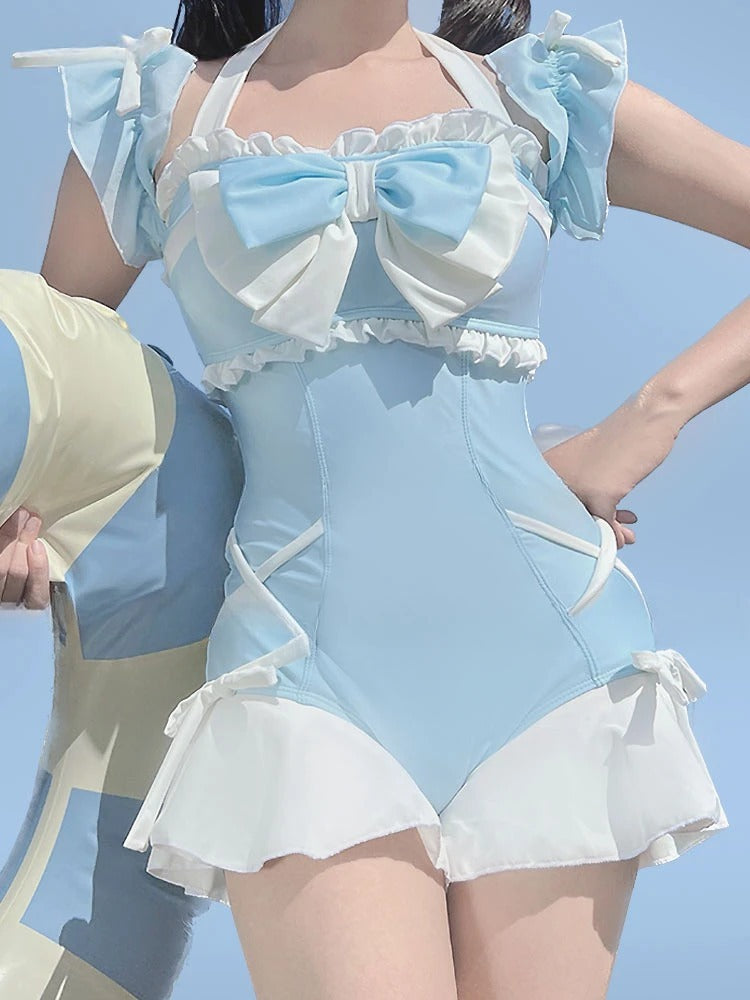 Coastal Dream Cutie Onesie in blue with soft lace and delicate ruffle trim