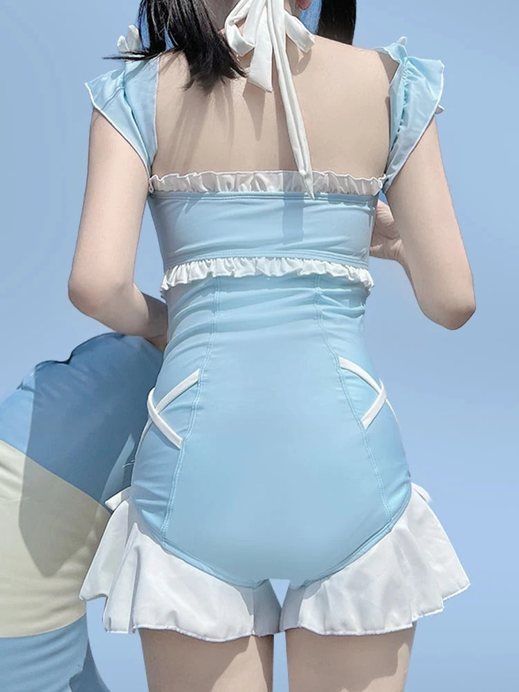 Cozy blue kawaii onesie with softcore style and seaside pastel aesthetic