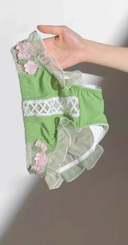 Cream pastel bustier and frilly panty set with floral embroidery and lace-up accents for DDLG ABDL soft girl aesthetic