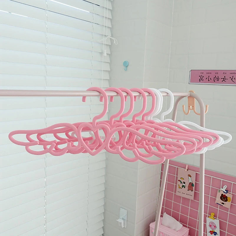 Cute Wings of Love closet hanger with heart centerpiece for ABDL DDLG kawaii aesthetic