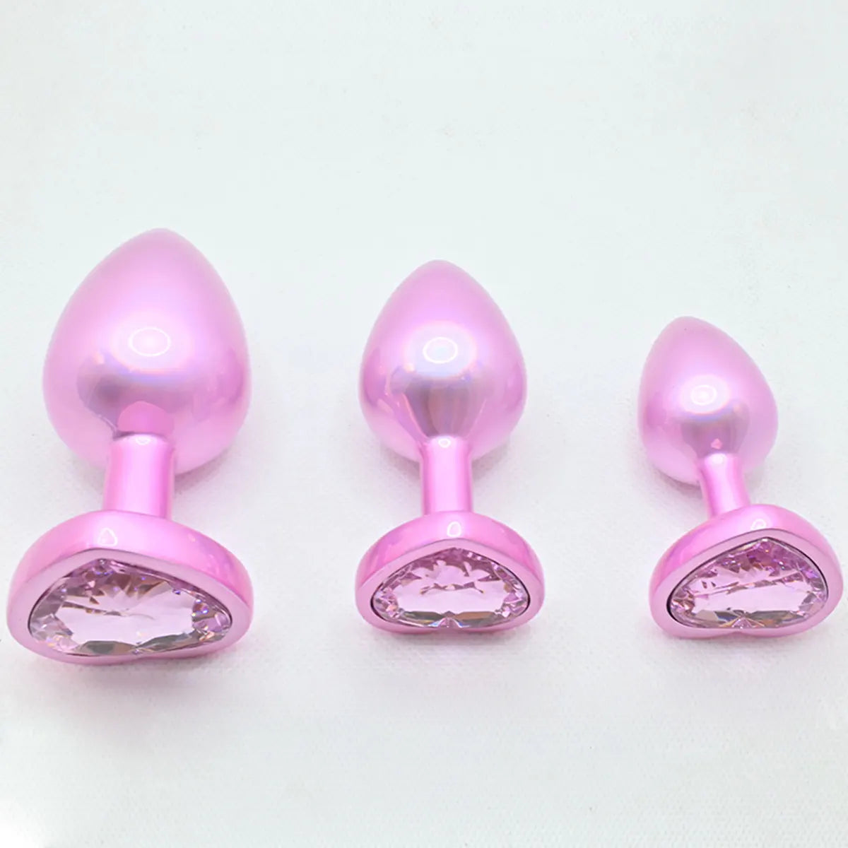 Cute yet kinky holographic pink heart plug for DDLG, ABDL, and cutecore fantasy play