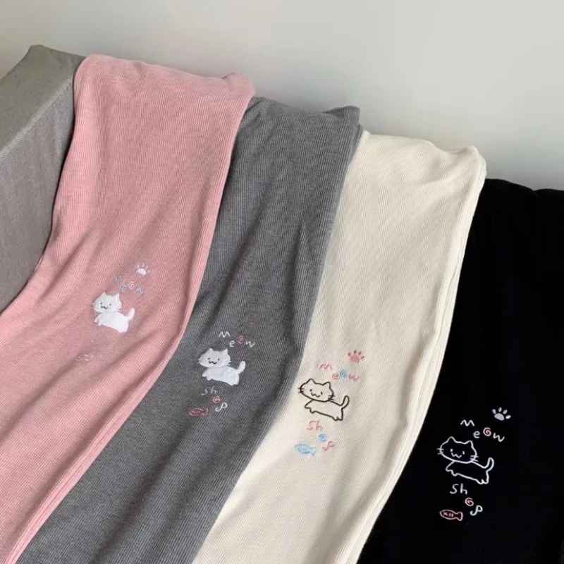 Set of kawaii wide leg sweatpants in pink, gray, apricot, and black with playful cat drawing for DDLG ABDL