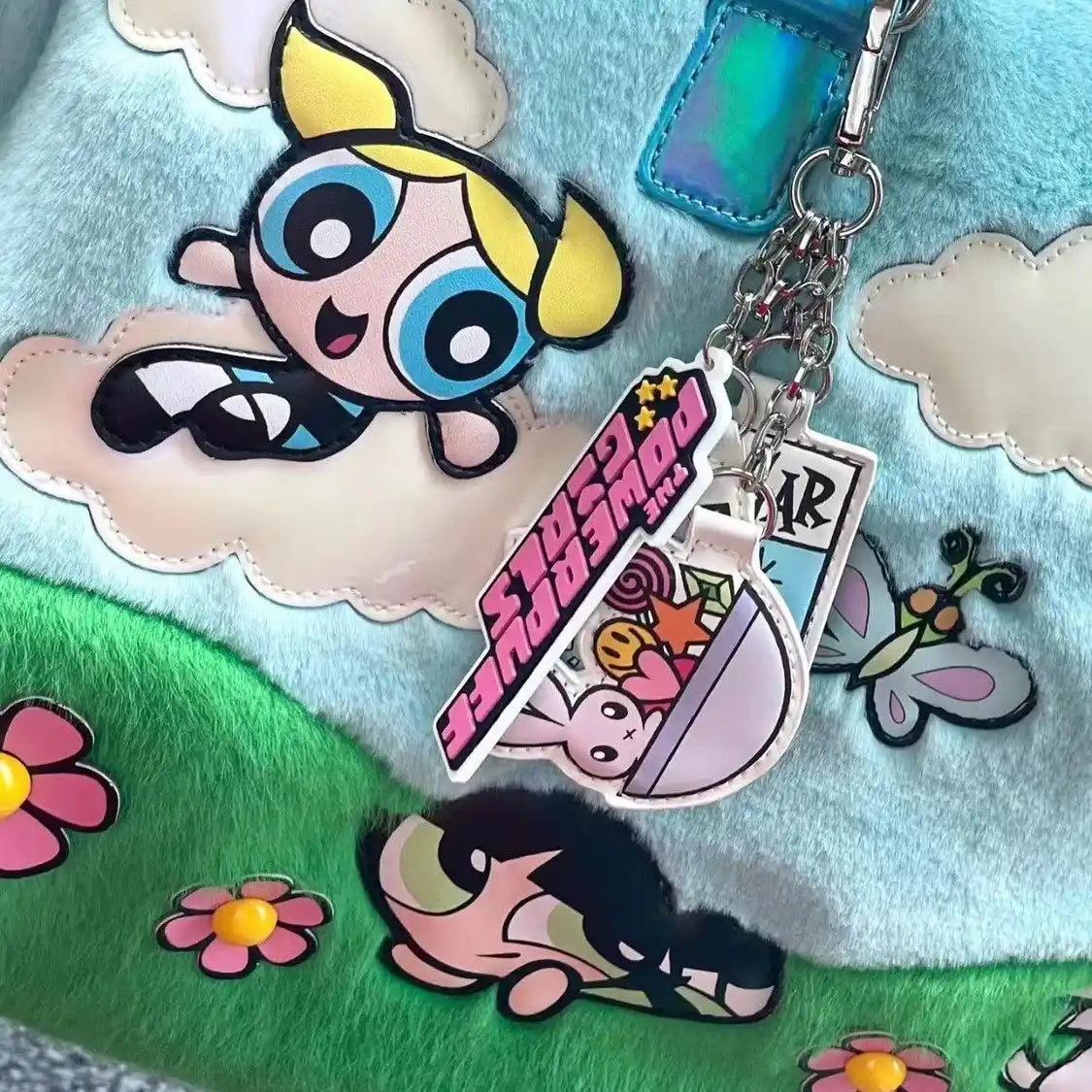 Side view of blue pastel plush Girlcore bag with holographic straps, perfect for soft girl fashion