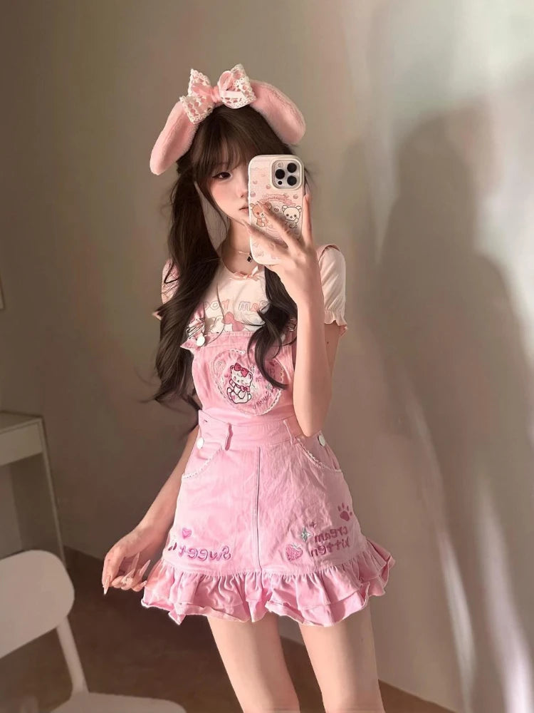 DDLG pastel kawaii outfit featuring bubblegum pink suspender skirt and matching top, soft breathable fabric for comfort