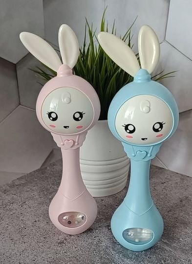 Dreamy Pastel Bunny Rattle with music, gentle light, and tactile silicone ears