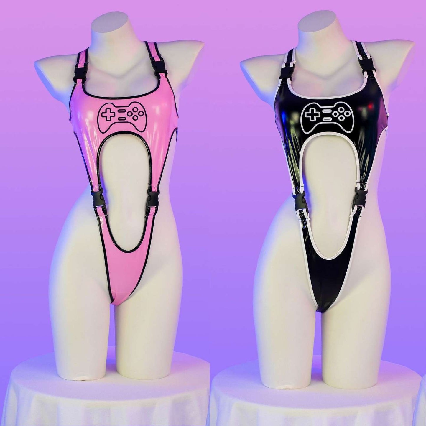 Egirl micro buckle bodysuit in pink and black front view, edgy straps and cutecore ddlg abdl style