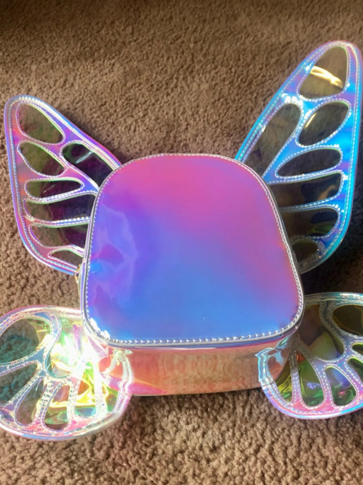 Euphoric Chrome Butterfly Backpack with dreamy blue and pink mix, cutecore butterfly wing details, trendy DDLG accessory