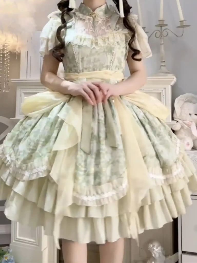 Flowy princess Lolita dress in soft sage cream tones, a summer wardrobe essential