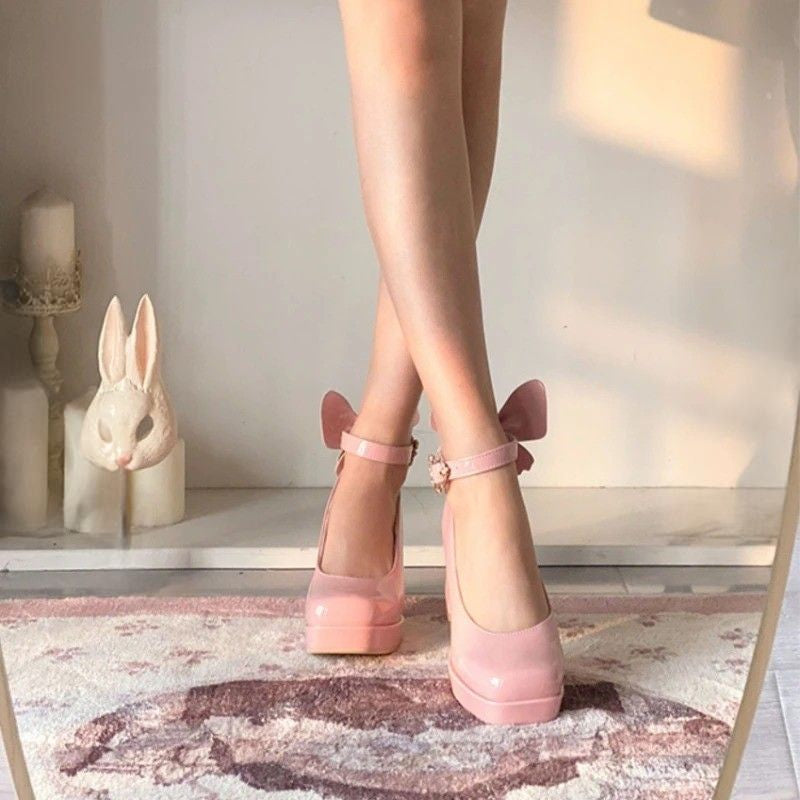 Pastel pink Flutterbaby 3D butterfly heels with double heart buckles for soft girl, DDLG, and cutecore aesthetics