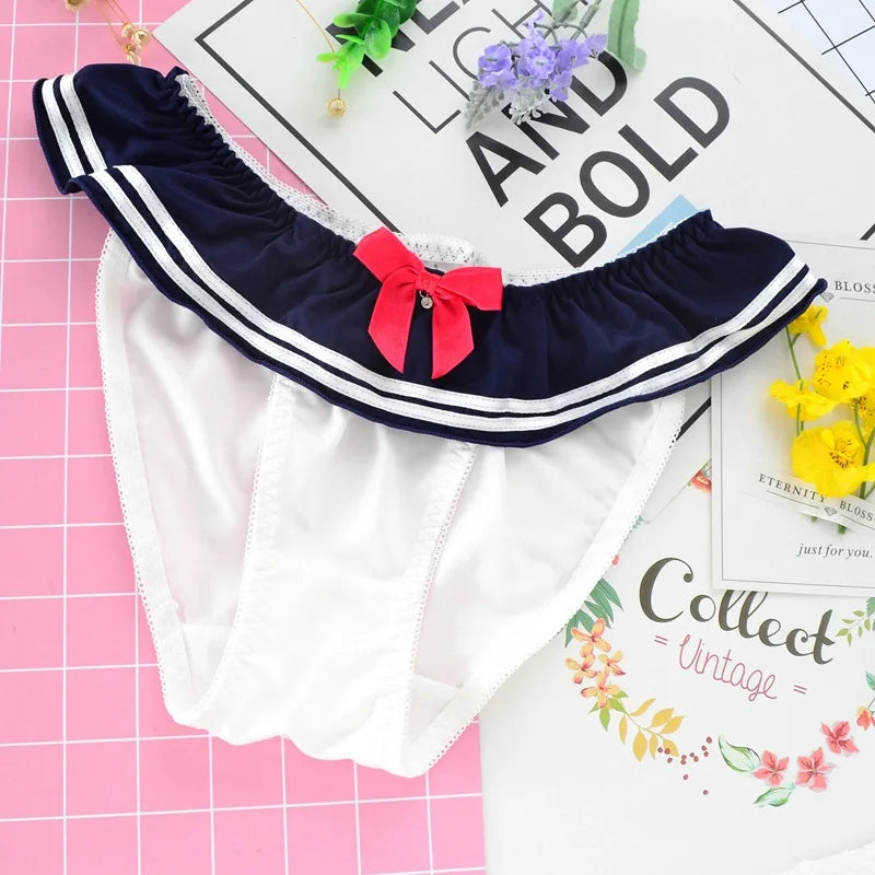 White navy Japanese schoolgirl panties with bow – soft kawaii fuku-style lingerie for cosplay or daily wear.
