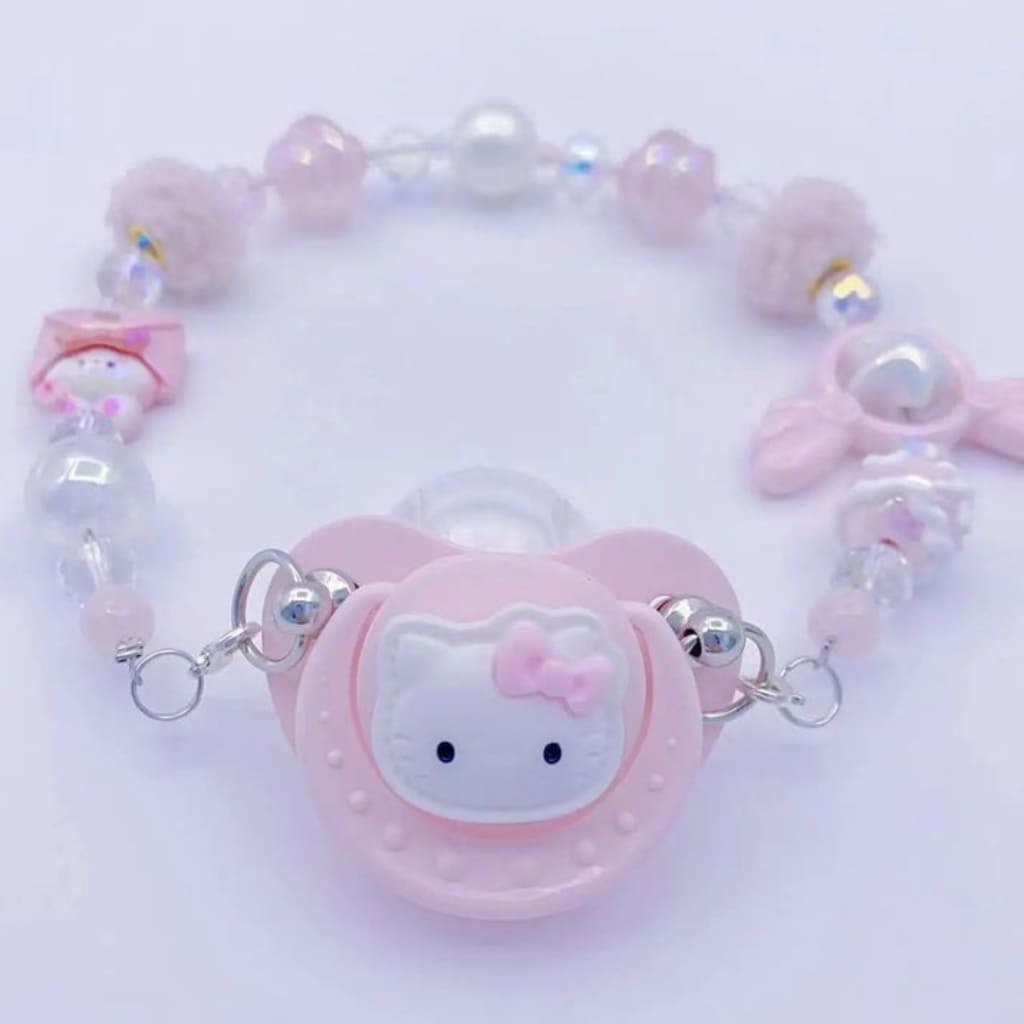 Glow-in-the-dark silicone pacifier featuring playful stars and wings for gentle baby comfort and calm.