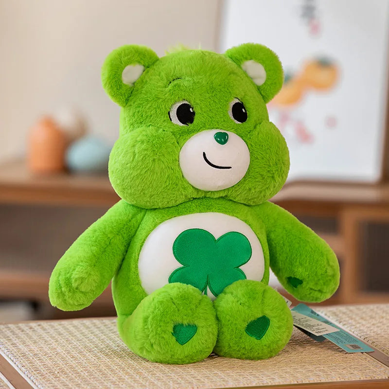 Green Rainbow Friends plush bear showing smirk expression with soft fabric