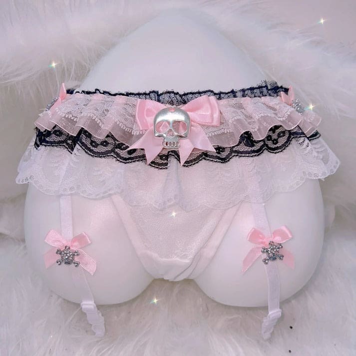 Skull lace lingerie set with delicate trim and flirty straps, combining spooky charm with sweet Y2K style
