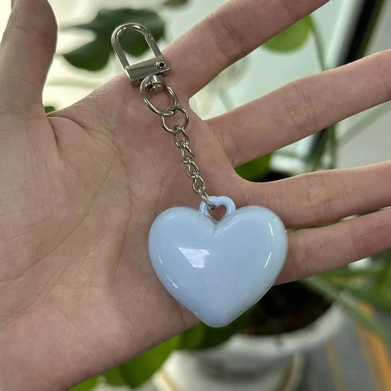 Baby blue Heart Glow Mirror Keychain closed β mini heart keychain with hidden mirror for everyday kawaii touch-ups
