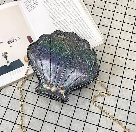 Black mermaid seashell bag with iridescent glow, kawaii DDLG ABDL aesthetic for pastel goth and oceancore brats ππ€