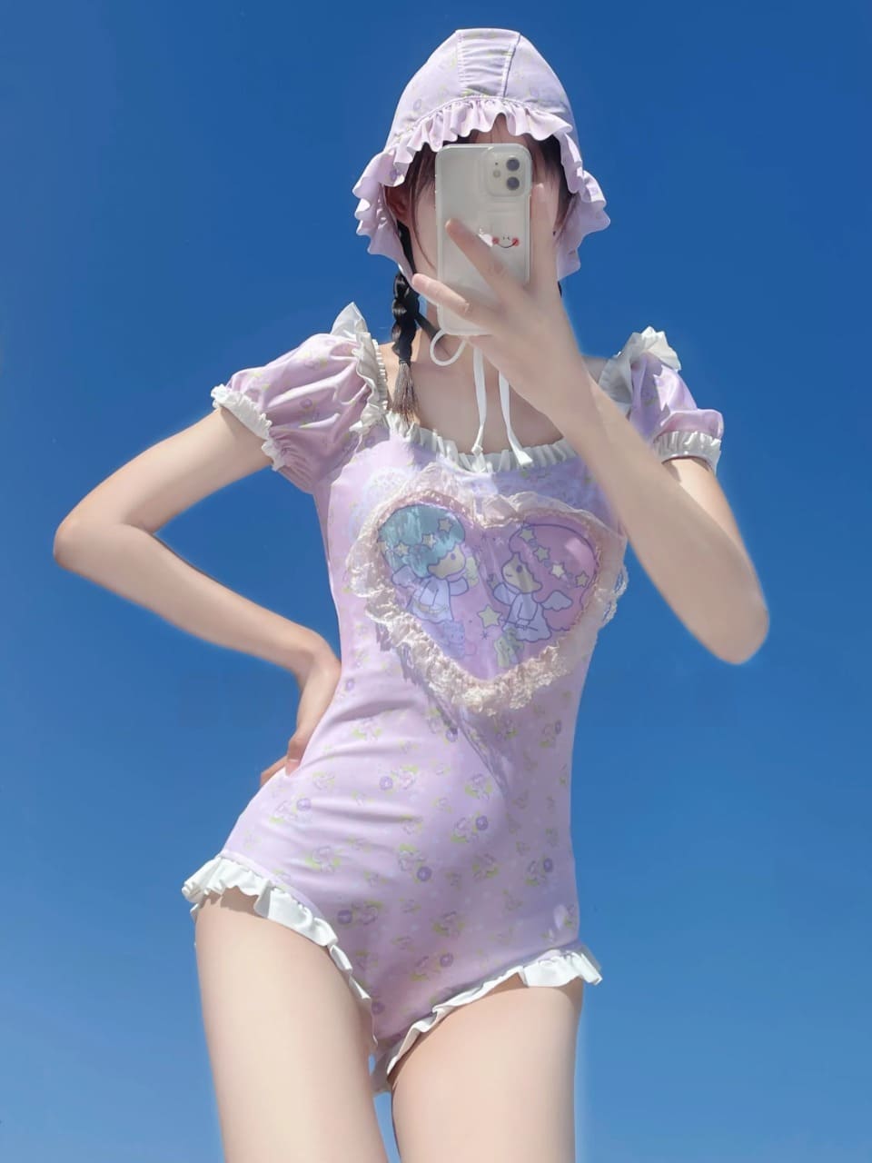 Kawaii angelic onesie in pastel pink with ruffle trim and softcore kawaii fashion details
