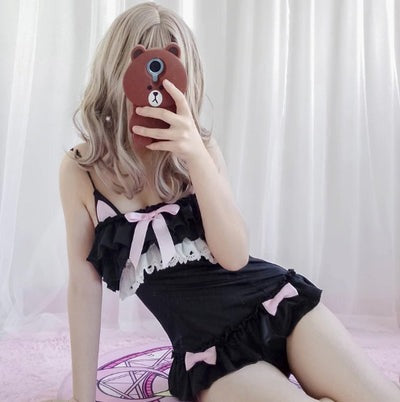 kawaii black kitty play onesie frilly layers with bows perfect for pastel little-space roleplay