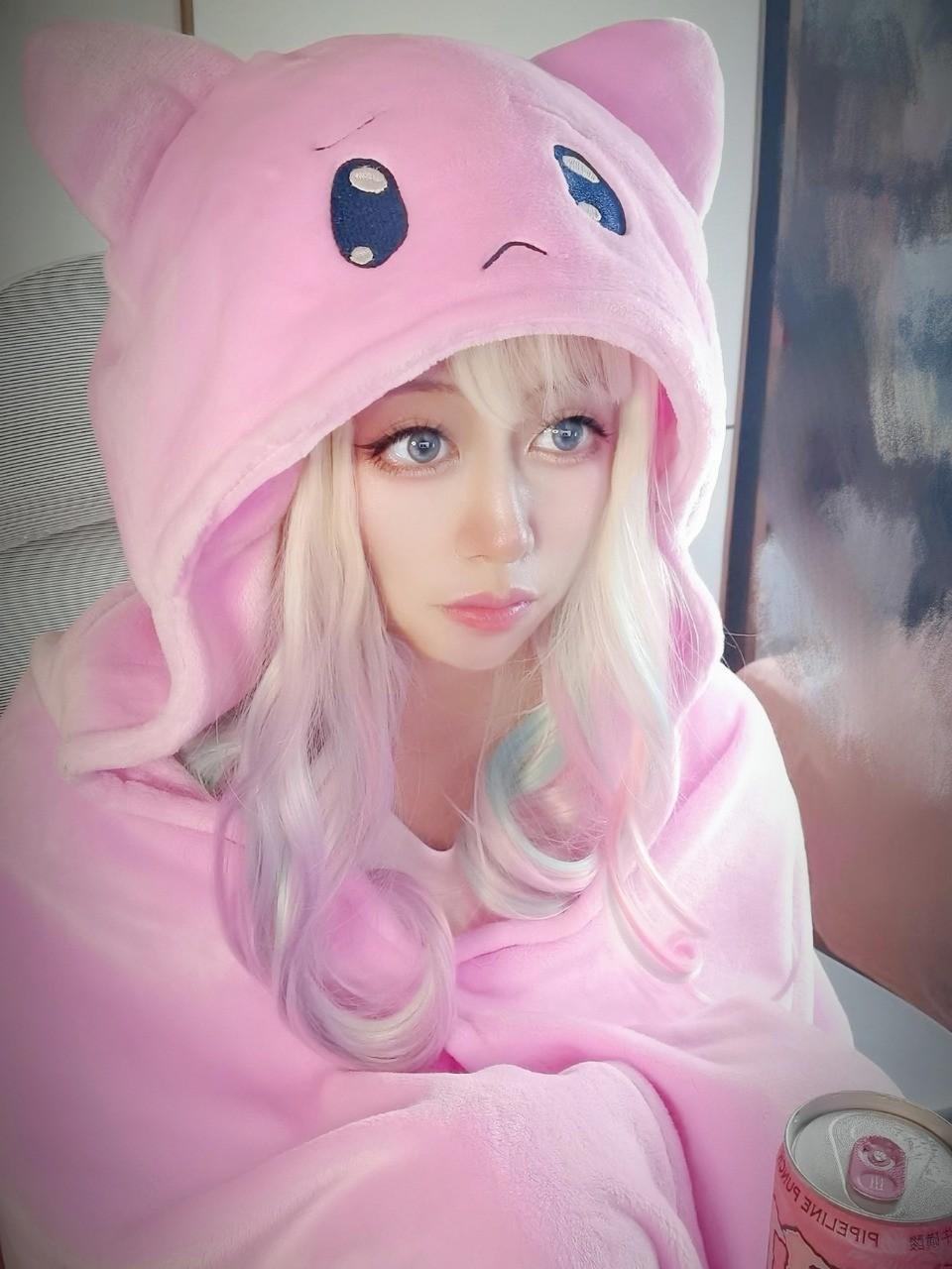 dreamy kawaii pink cat blanket with ears and embroidered face for cuddles, regression, and aesthetic bedrooms