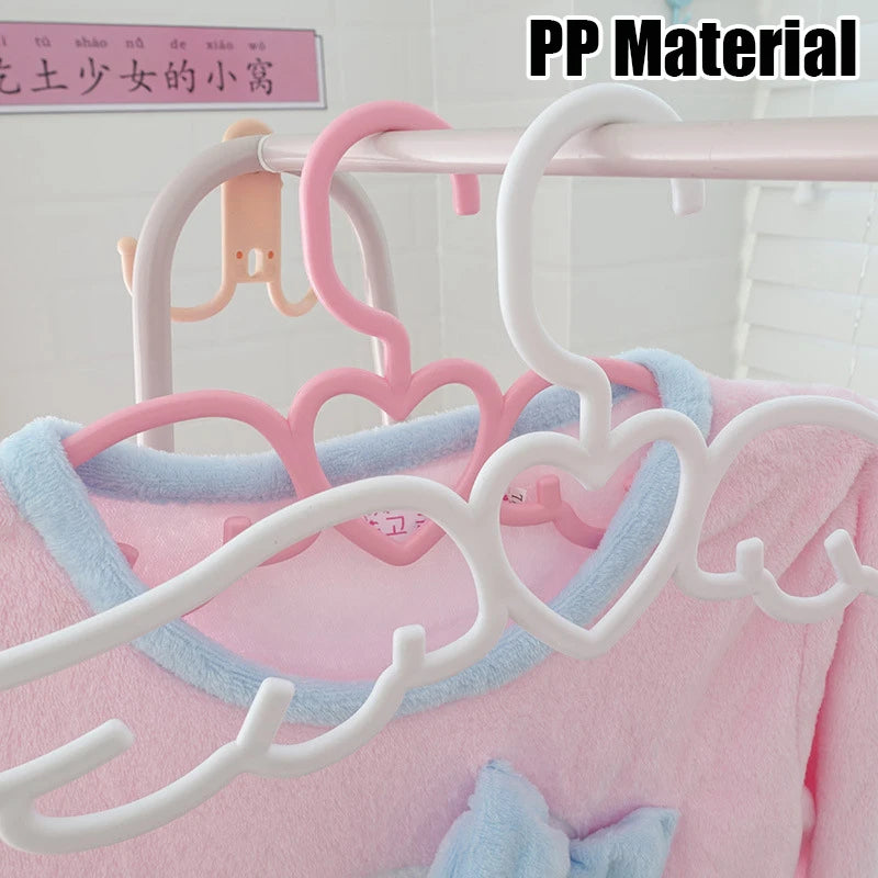 Kawaii cutecore closet hanger with heart and wing design for dreamy ABDL DDLG style