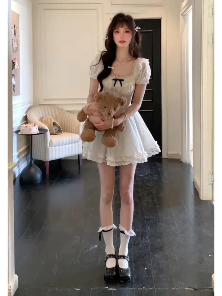 Kawaii DDLG mini dress with white frills and black ribbon, cozy cute cutecore aesthetic