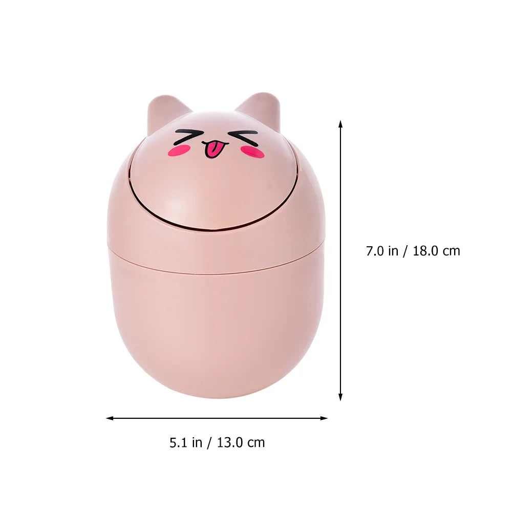 Compact pink Kawaii Face Expressions Mini Trash Can, perfect for little kawaii spaces
