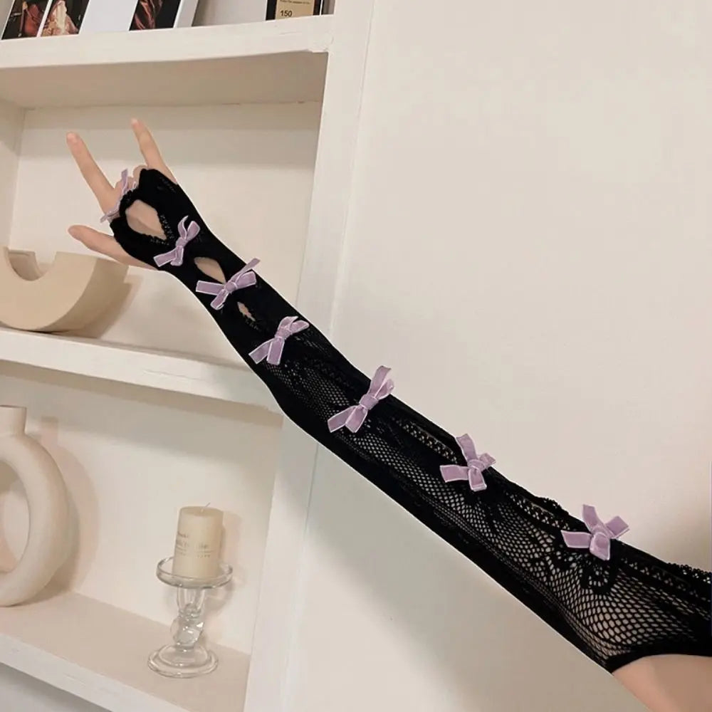 Full-arm lace bolero gloves in black and lilac, kawaii cutecore style with ribbon accents for cosplay, little space, and playful pastel outfits