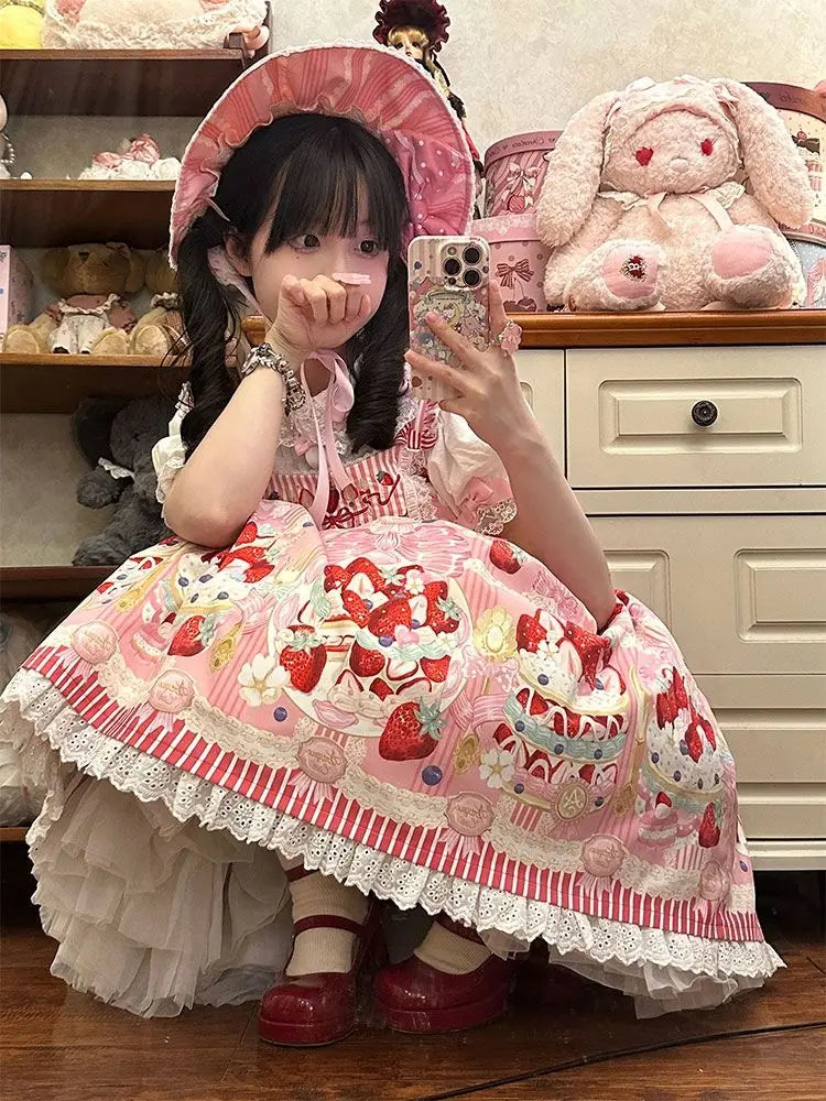 Kawaii Lolita blouse in pastel pink and white with puff sleeves and bows