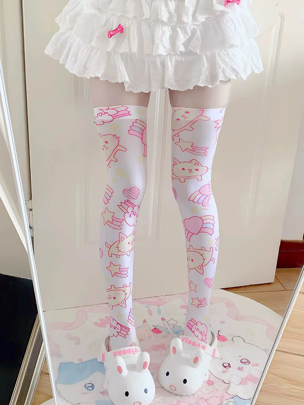 Pastel pink kawaii magic kitty stockings with cute prints, perfect for DDLG littles and pastel baddie aesthetics.