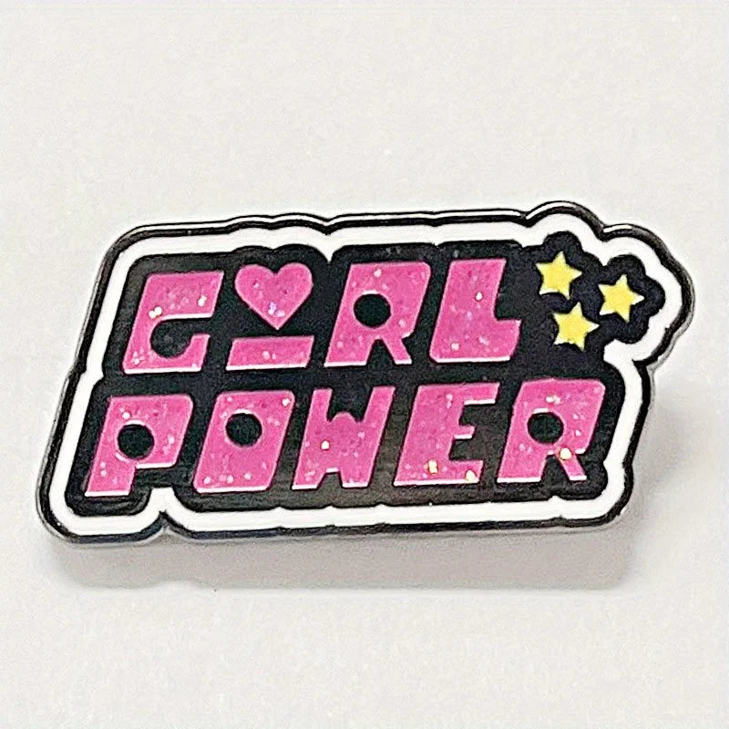 Compact kawaii pink girl power pin, ideal for layering on backpacks and jackets