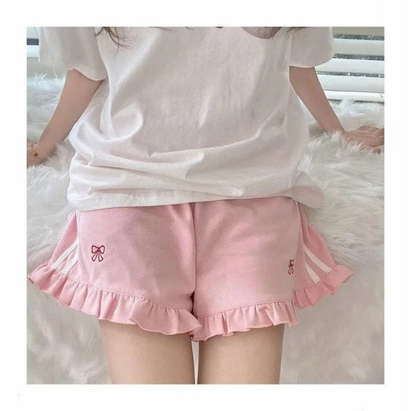 Cute pink lounge shorts with ribbon embroidery, side stripes, and ruffles for soft girl and ABDL fashion